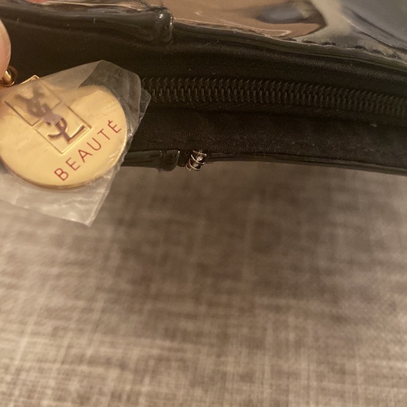 50% off..
YSL makeup pouch - Picture 4 of 6